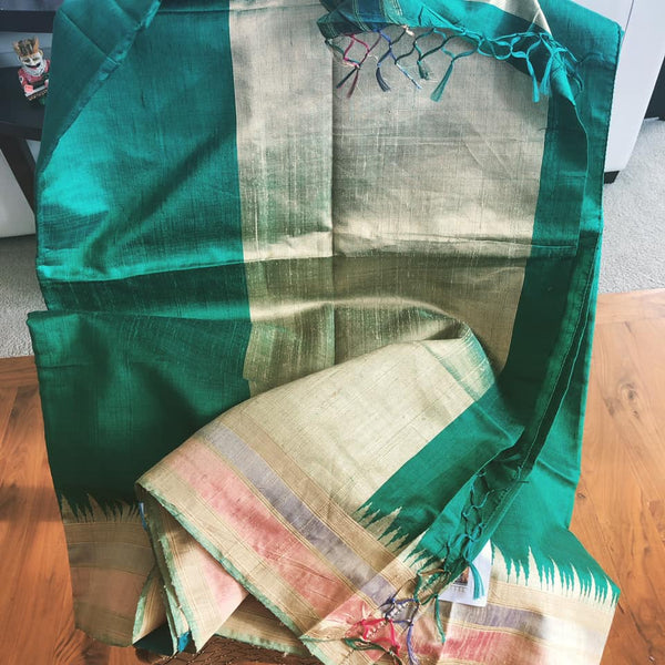 Pure Tussar Dupion Silk in Deep Green with Golden Multicolored Matte Temple Border with Golden Aachal with Tassels