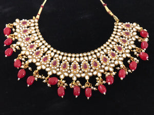 Gold Colored Kundan Choker Necklace Set with Red Beads & Matching Earrings