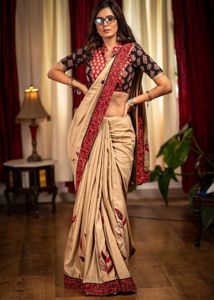 BEIGE SEMI SILK SAREE WITH HAND APPLIC WORK