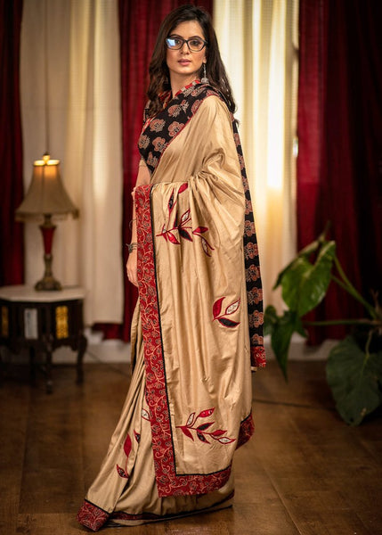 BEIGE SEMI SILK SAREE WITH HAND APPLIC WORK