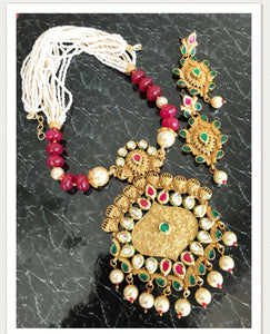 Gold Stone Kundan Necklace Set with Matching Earrings with Red & Green Stones