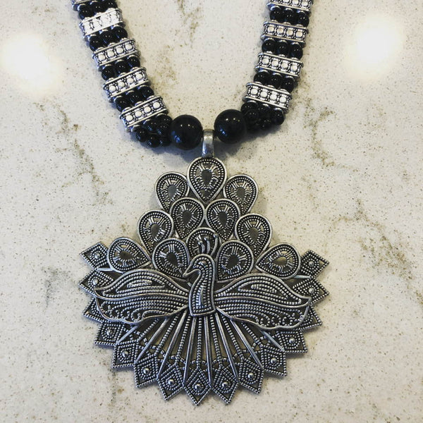 Peacock Shaped German Silver Black Colored Necklace Set with Earrings