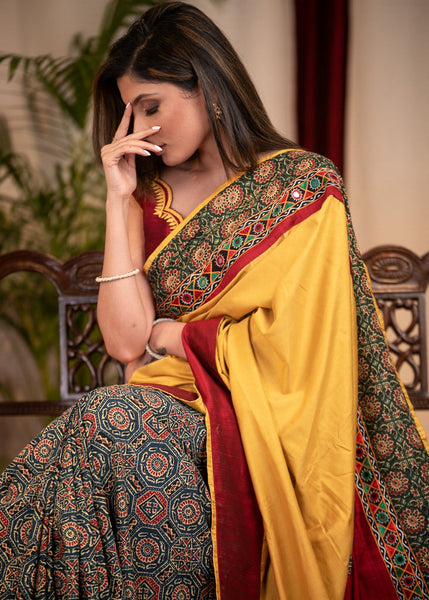 MUSTARD SEMI SILK SAREE WITH PRINTED AJRAKH PLEATS & MIRROR WORK BORDER