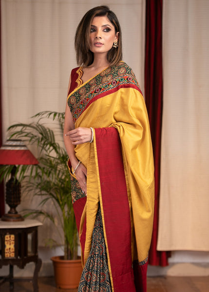 MUSTARD SEMI SILK SAREE WITH PRINTED AJRAKH PLEATS & MIRROR WORK BORDER