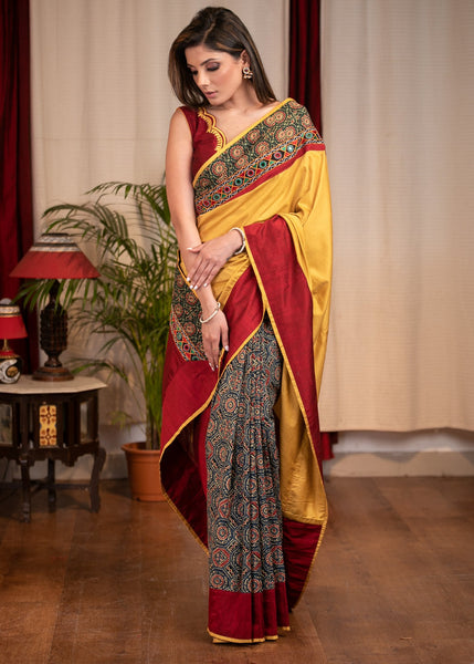 MUSTARD SEMI SILK SAREE WITH PRINTED AJRAKH PLEATS & MIRROR WORK BORDER