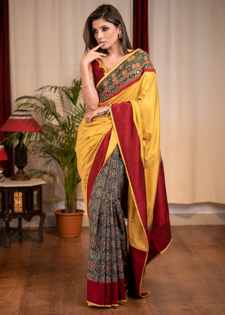 MUSTARD SEMI SILK SAREE WITH PRINTED AJRAKH PLEATS & MIRROR WORK BORDER