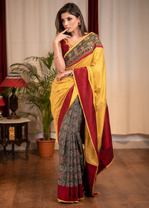 MUSTARD SEMI SILK SAREE WITH PRINTED AJRAKH PLEATS & MIRROR WORK BORDER