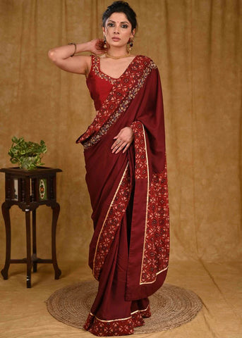 Chique Maroon Rayon Saree With Elegant Zardosi Work And Ajrakh Border