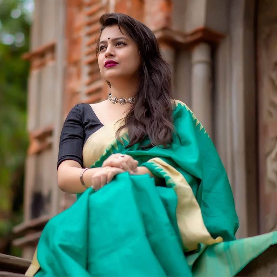 Pure Tussar Dupion Silk in Deep Green with Golden Multicolored Matte Temple Border with Golden Aachal with Tassels