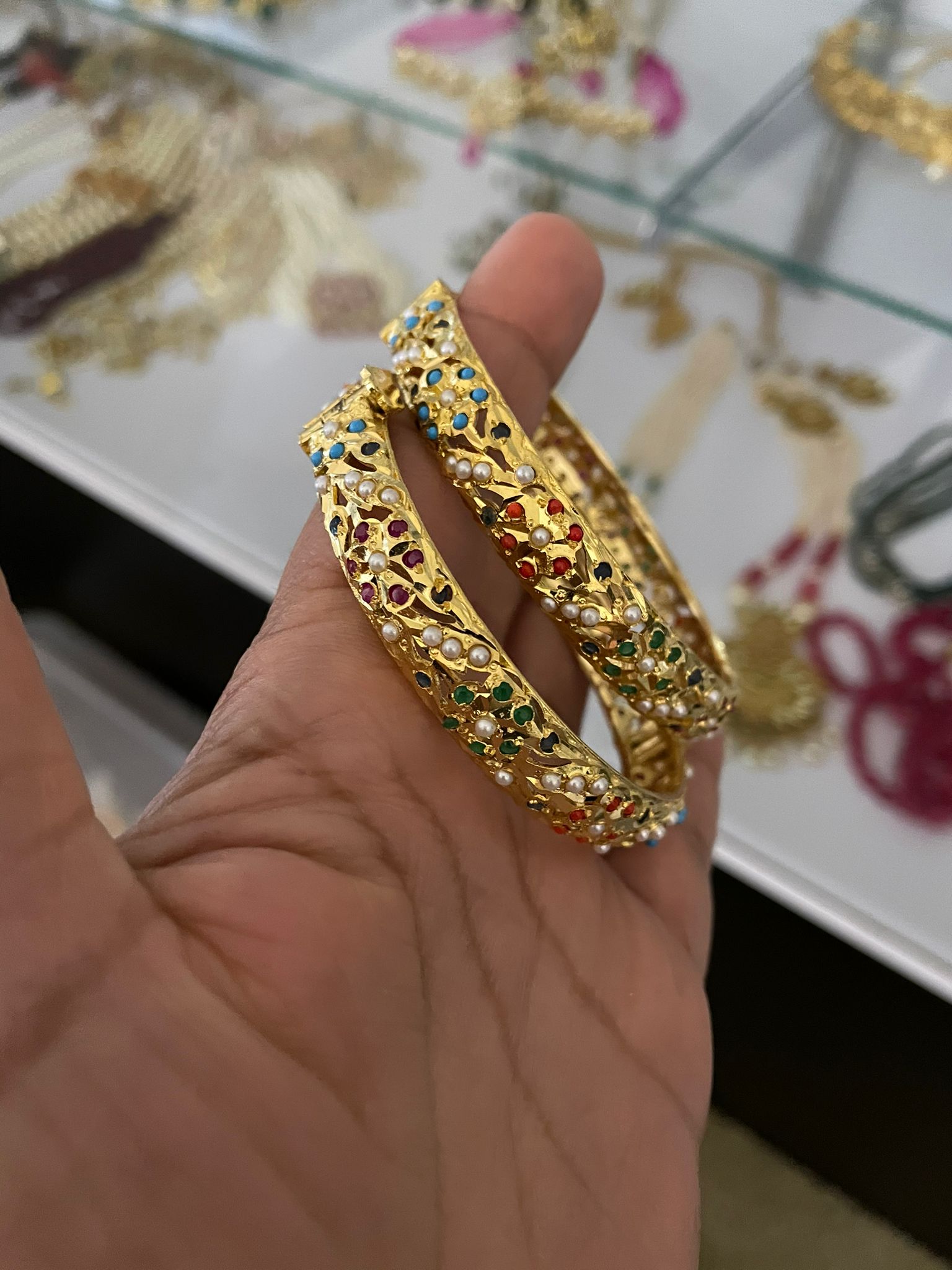 Hydrabadi Jaddau Navratan Bangles in gold finish