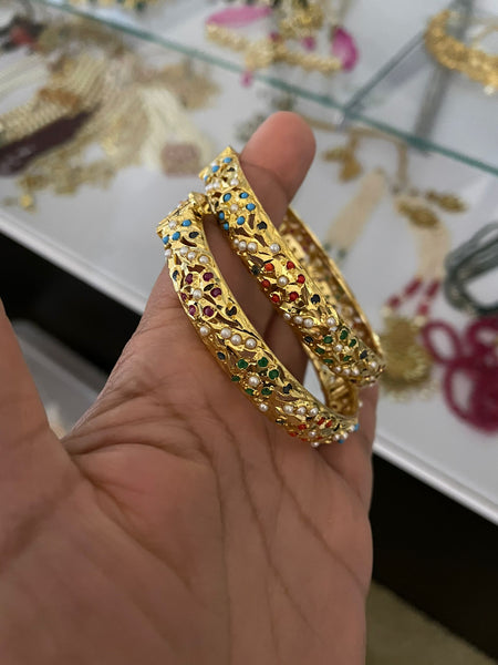 Hydrabadi Jaddau Navratan Bangles in gold finish