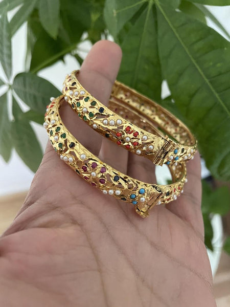 Hydrabadi Jaddau Navratan Bangles in gold finish