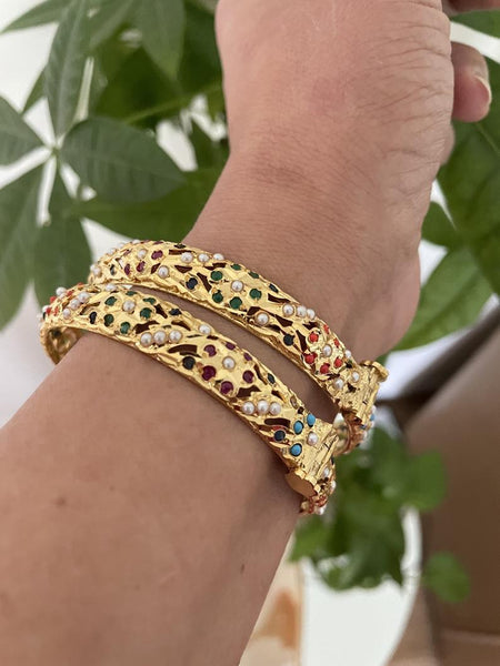Hydrabadi Jaddau Navratan Bangles in gold finish