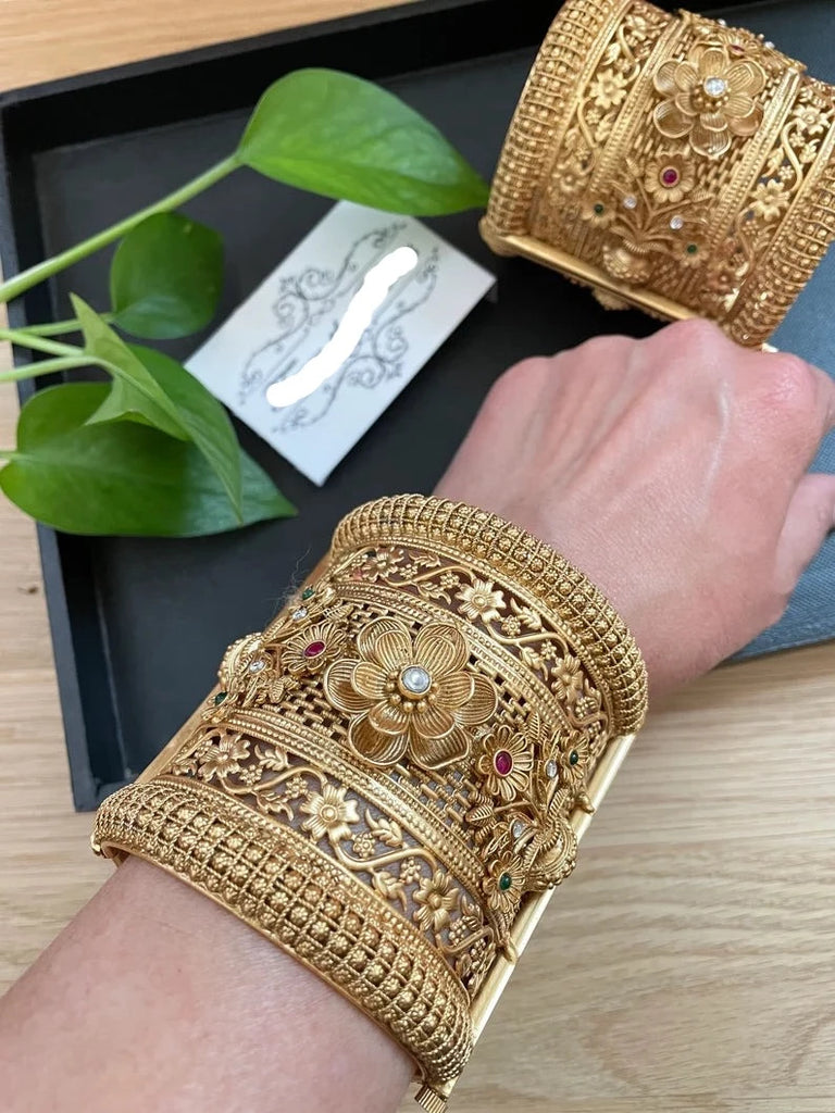 Gold wide bangles best sale designs