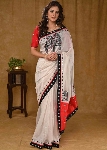 WHITE AND RED CHANDERI SAREE WITH DELICATE HAND WORK AND BLACK IKAAT BORDER