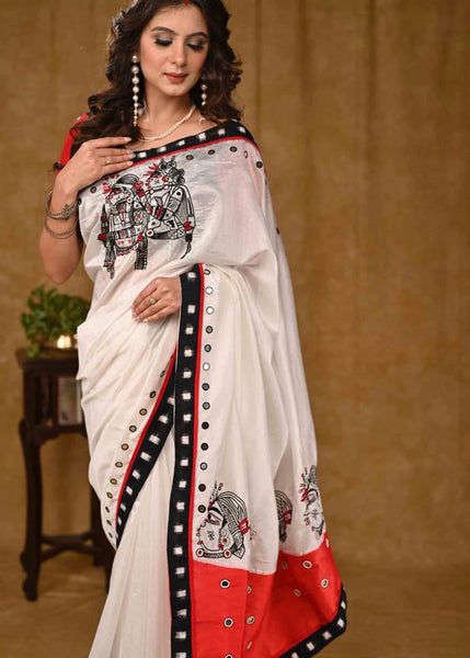 WHITE AND RED CHANDERI SAREE WITH DELICATE HAND WORK AND BLACK IKAAT BORDER