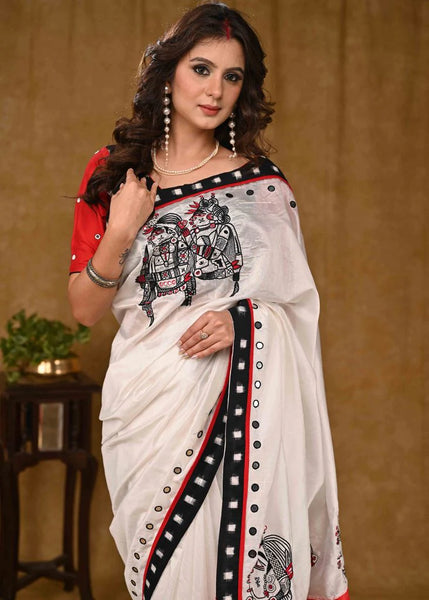 WHITE AND RED CHANDERI SAREE WITH DELICATE HAND WORK AND BLACK IKAAT BORDER
