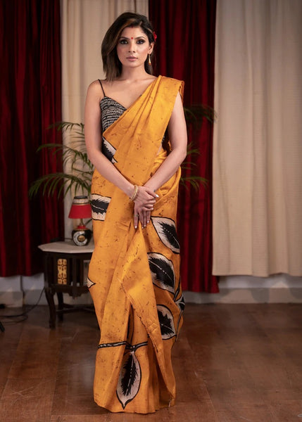 PURE SILK HAND BATIK MUSTARD YELLOW SAREE WITH WARLI DESIGN MOTIFS
